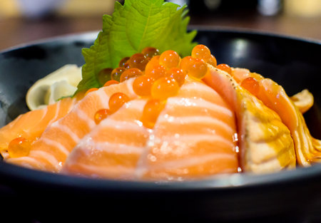 Salmon Sashimi Rice and Salmon Eggs ready to serve in japanese restaurant.の写真素材