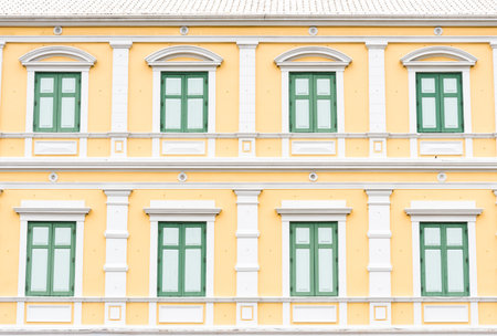 Grenn and Yellow Vintage Windows Pattern and wallpaper has architecture in Bangkok Thailand.
