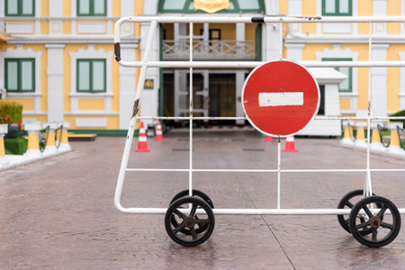 No entry and pass red sign to the palace in Bangkok Thailandの写真素材