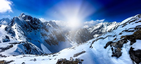 Snow Mountain Range Landscape with Blue Skyの写真素材