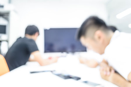 Two man has meeting  on break time and relaxing time in the business office.の写真素材