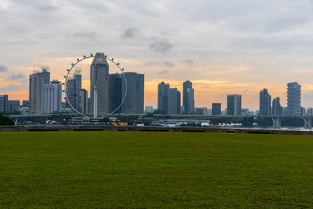 MARINA BAY SANDS, SINGAPORE - May 23, 2017: Singapore Flyer view from Marina Barrage on sunset time at Marina Bay Sands Singapore.のeditorial素材