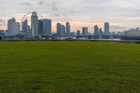 MARINA BAY SANDS, SINGAPORE - May 23, 2017: Singapore Flyer view from Marina Barrage on sunset time at Marina Bay Sands Singapore.のeditorial素材
