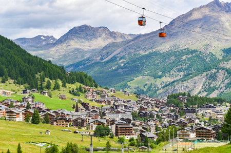 Villages with mountain background in Switzerland.のeditorial素材