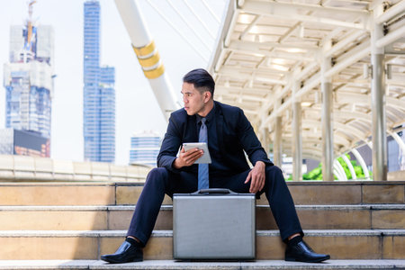 The asian businessman has thinking and looking forward to the business vision future.の写真素材