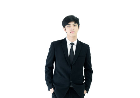 Asia businessman with black suit and black necktie isolated on white background.の写真素材