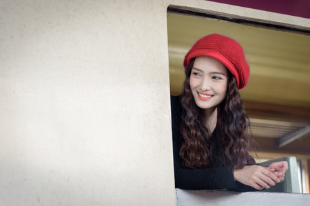Asian woman traveler has exciting with traveling by train at Hua Lamphong station at Bangkok,...