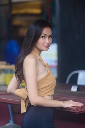 Asian pretty and sexy portrait girl has relaxing at coffee cafe restaurant in the morning.の写真素材