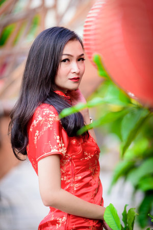 Portrait of Asian Chinese and Thai girl with Happy Chinese New Year concept.の写真素材