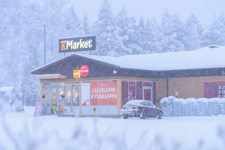 Editorial: Tuupovaara City, Finland, 25th December 2018. K Market with heavy snow in winter season at Tuupovaara, Finland.のeditorial素材