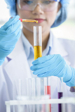 Asian young girl student scientist researching  and learning in a laboratory.の写真素材