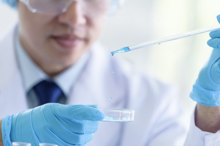 Asian senior scientist male researching and learning in a laboratory.の写真素材
