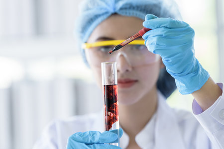 Asian young girl student scientist researching  and learning in a laboratory.の写真素材