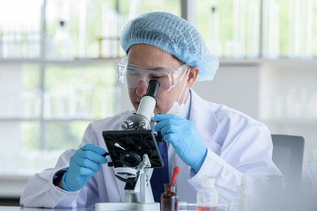 Asian man scientist researching  and learning in a laboratory.の写真素材