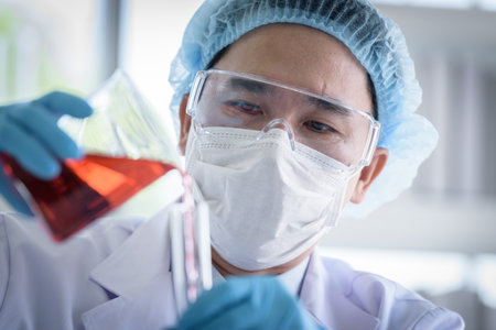 Asian man scientist researching and learning in a laboratory.の写真素材