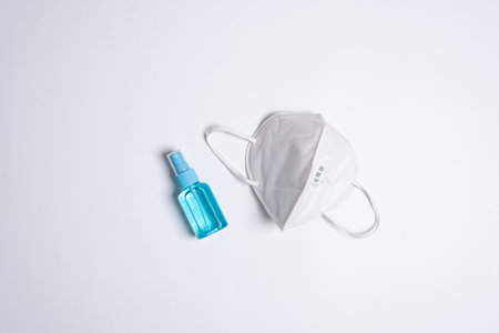 The equipment to protect COVID-19, white mask and hand cleaner gel with Isolated on white background concept.の写真素材