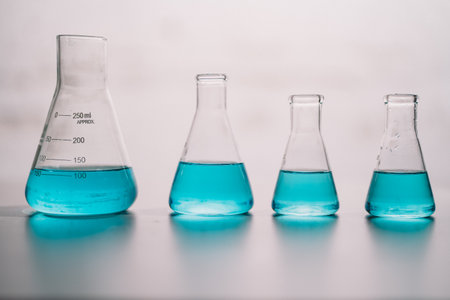In laboratory contains tube, beaker, liquid, virus and samples. Liquid substance in equipment glassware for chemistry biology. development for analysis scientific. healthcare and medical concept.の写真素材