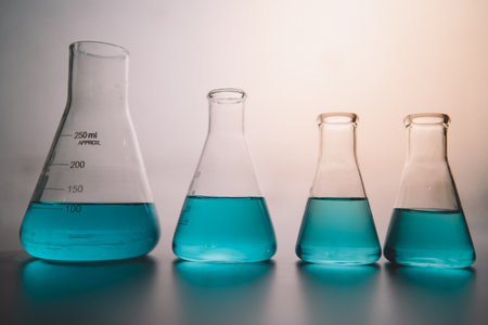 In laboratory contains tube, beaker, liquid, virus and samples. Liquid substance in equipment glassware for chemistry biology. development for analysis scientific. healthcare and medical concept.の写真素材
