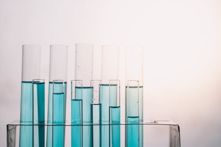 In laboratory contains tube, beaker, liquid, virus and samples. Liquid substance in equipment glassware for chemistry biology. development for analysis scientific. healthcare and medical concept.の写真素材