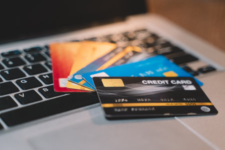 Customer using credit card for payment to owner business. cashless technology and credit card payment concept. through the internet for convenience.の写真素材