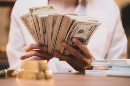 Background of one person success in your life. She are rich. Women have money, cash, gold.の写真素材