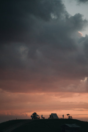 Sunset in mountains. Panorama mountains landscape with forest in to the wild.