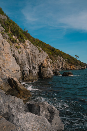The island's beach glowed under the summer sky, where ocean waves met the shore; a perfect blend of...