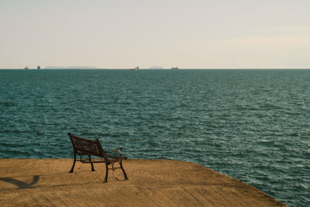 The island glowed beneath the summer sky as the sun set over the ocean, painting the seascape in...