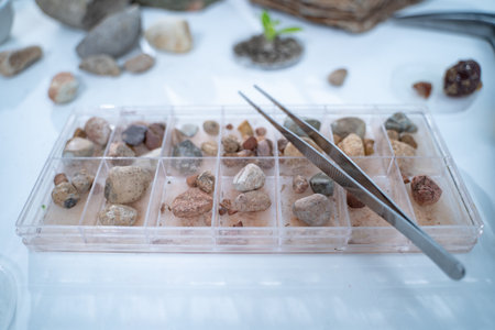 In the laboratory, research equipment rests on the table as scientists analyze rock samples, using advanced geology techniques to make groundbreaking discoveries in science.の写真素材