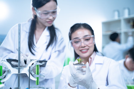 In the green laboratory, biology and technology intersect as researchers conduct experiments on plants, using cutting-edge science to study the flora and advance environmental research.の写真素材