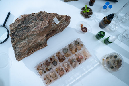 In the laboratory, research equipment rests on the table as scientists analyze rock samples, using advanced geology techniques to make groundbreaking discoveries in science.の写真素材