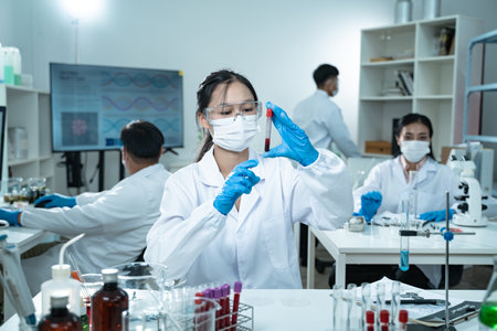 Laboratory research with blood sample in test tube for medical analysis related to health and medicine aiming to study results and improve clinical understandingの写真素材