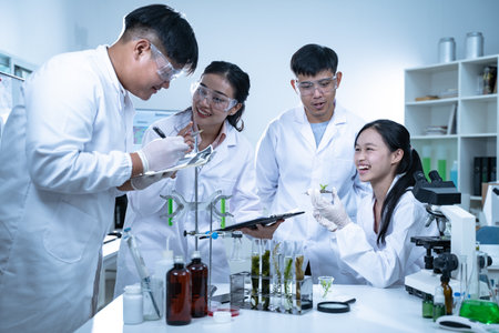 In the green laboratory, biology and technology intersect as researchers conduct experiments on...