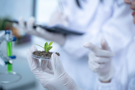 In the green laboratory, biology and technology intersect as researchers conduct experiments on...