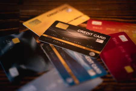 Customer using credit card for payment to owner business. cashless technology and credit card payment concept. through the internet for convenience.の写真素材