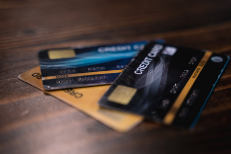 Customer using credit card for payment to owner business. cashless technology and credit card payment concept. through the internet for convenience.の写真素材