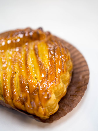 Delicious freshly baked bakery in baking paper, Vertical viewの写真素材