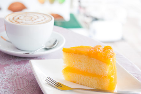 Coffee and orange cake の写真素材