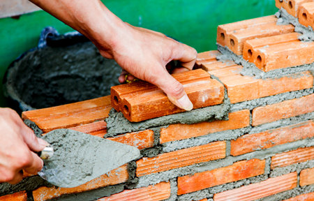 Construction using brickの写真素材
