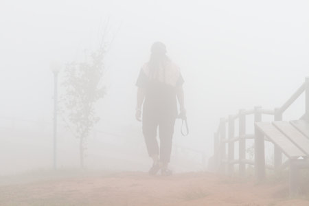 Walking in the misty morning Thailand.の写真素材