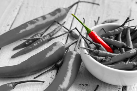 Chili with red, but black and white and color performance.の写真素材