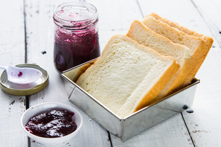 Bread for breakfast and a blueberry jam made more deliciousの写真素材