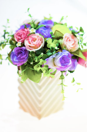 Fake flowers with vaseの写真素材