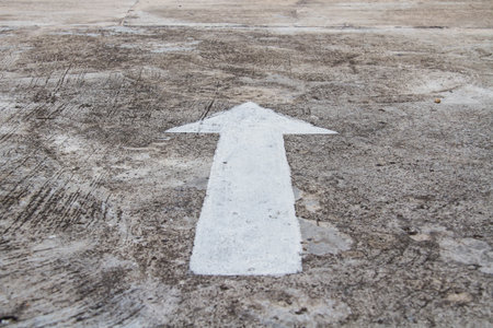 The arrows on the cement floor.の写真素材