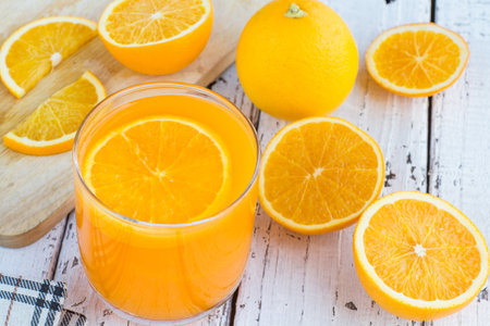 Be cut to remove the orange juice to drink and eat and be healthy.の写真素材