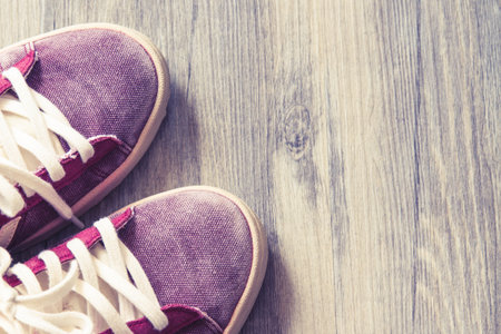 Sneakers made vintage feel comfortable and used as background.の写真素材