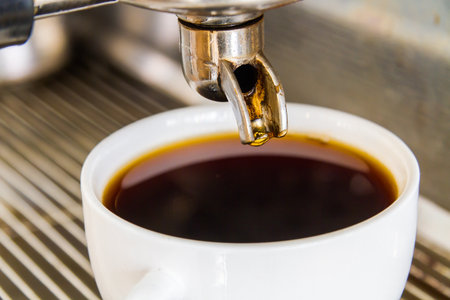 Coffee Maker and white coffee cups and vintage images.の写真素材