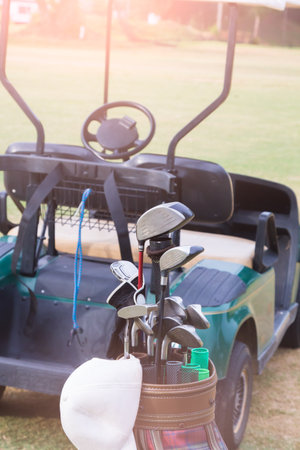 Golf car parked in golf is a sport that is very popular and healthy.の写真素材