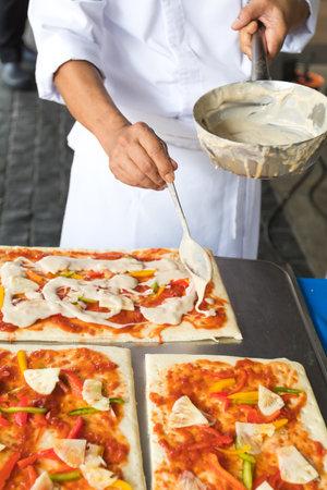 Pizza is an Italian restaurant that is popular around the world cooked by chefs who are capable of doing the dishes cooked with tomato sauce and a variety of vegetables and herbs.の写真素材