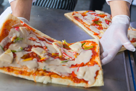 Pizza is an Italian restaurant that is popular around the world cooked by chefs who are capable of doing the dishes cooked with tomato sauce and a variety of vegetables and herbs.の写真素材